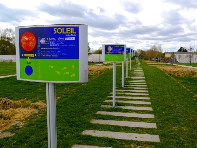 In the park, there’s also a scale model of the planets of the solar system. Because why not?!